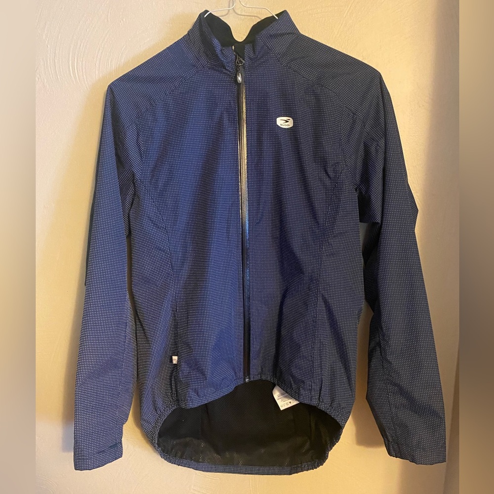 Sugoi women's lightweight, reflective Zap bike / cycling jacket- size M (medium)